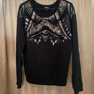 Express black fleece pullover with embellishment. Size small